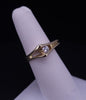 18K Yellow Gold Ring with 2 a round Diamond's