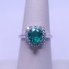 Round cut Emerald with Diamond in 18K  White Gold