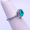 Round Cut  Emerald Rind in Platinum