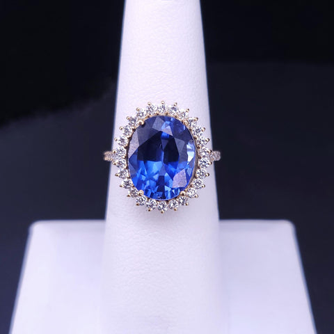 Regal Oval Sapphire Diamond Halo Statement Ring