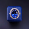 Regal Oval Sapphire Diamond Halo Statement Ring
