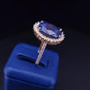 Regal Oval Sapphire Diamond Halo Statement Ring