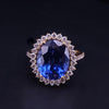 Regal Oval Sapphire Diamond Halo Statement Ring