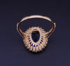 Regal Oval Sapphire Diamond Halo Statement Ring