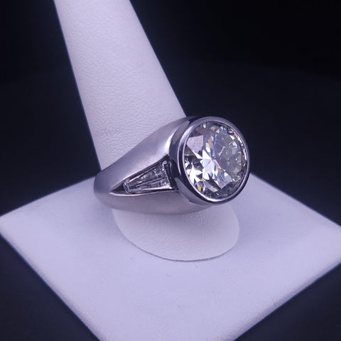 Natural Round Brilliant Diamond Ring in  Platinum with Tapered Baguettes