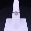 Elegant Diamond Bypass Ring with Dual Round Stones