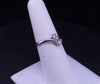 Elegant Diamond Bypass Ring with Dual Round Stones