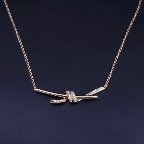 Tiffany Knot Pendant in Yellow Gold with Diamonds