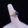 Vintage Oval Blue Sapphire Cabochon and Baguette Diamond Ballerina Ring