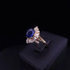 Vintage Oval Blue Sapphire Cabochon and Baguette Diamond Ballerina Ring