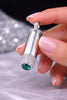 Modern White Gold Bullet Pendant with Pavé Diamonds & Emerald
