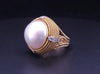 Cassis white pearl and diamond cocktail ring set in 18k yellow gold.