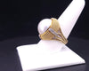 Cassis white pearl and diamond cocktail ring set in 18k yellow gold.