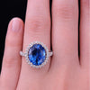 Regal Oval Sapphire Diamond Halo Statement Ring