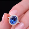 Regal Oval Sapphire Diamond Halo Statement Ring