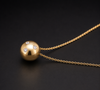 Tiffany & Co. 18 Karat Yellow Gold Etoile Diamond Platinum Ball Pendant Necklace