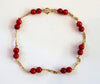 Sixteen Coral Red Bead Women Bracelet in 14k Yellow Gold